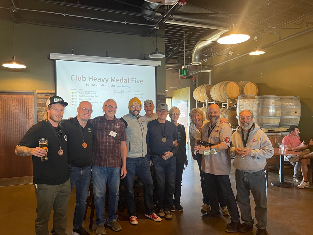 Aurora City Brew Club members pose for a photo after winning the heavy medal club award at the Brew Hut Homebrew Competition